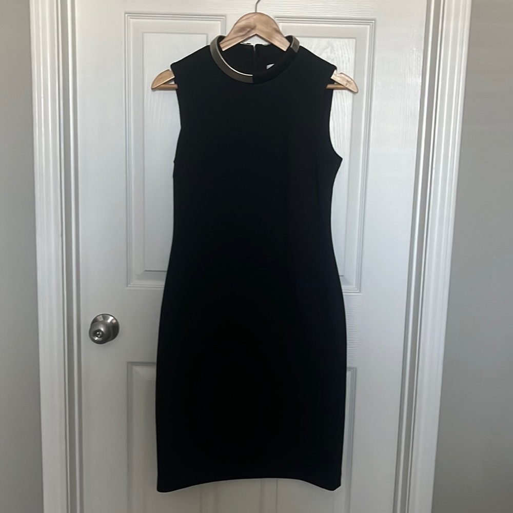 A Calvin Klein formal fitted dress, all black and size 8